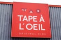 Tape ÃÂ  l`oeil logo brand and text sign storefront signage front of fashion clothing